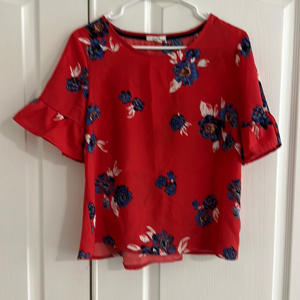 Pretty ruffle sleeve tie back blouse